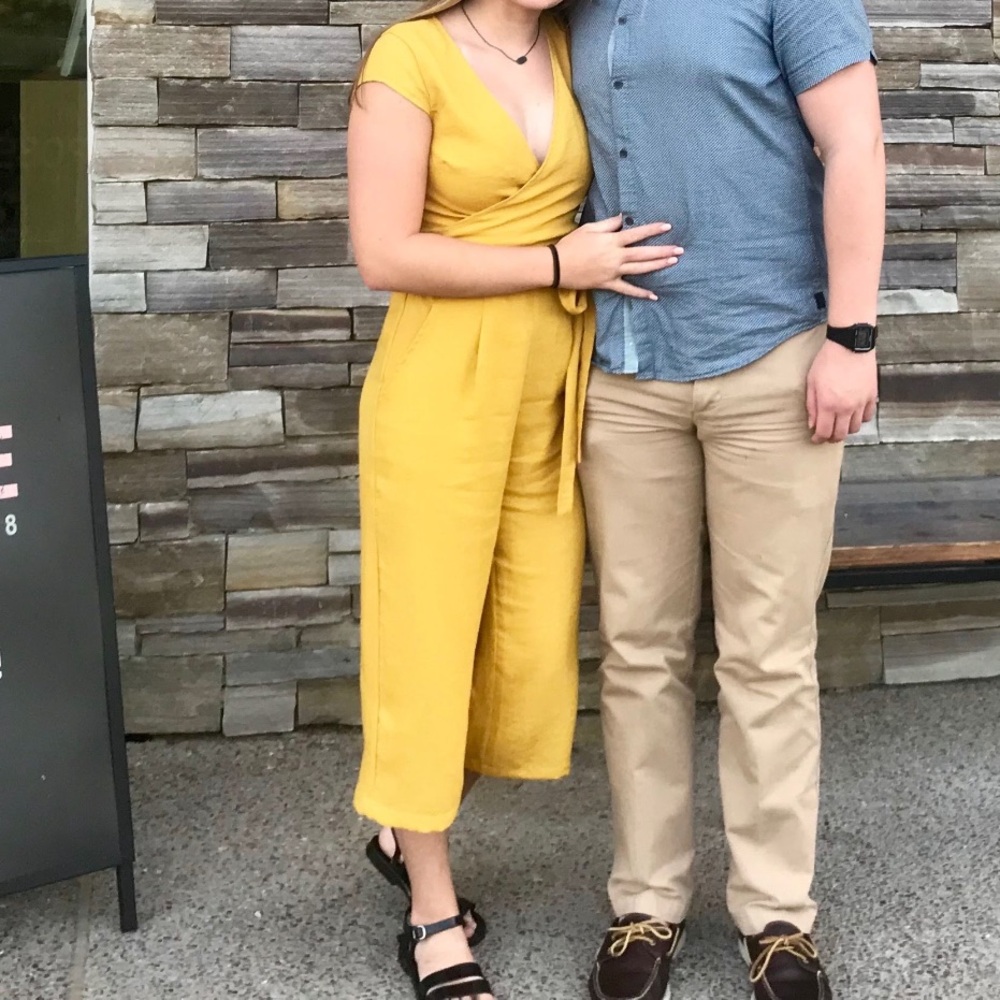 Mustard linen jumpsuit with tie & small cutout